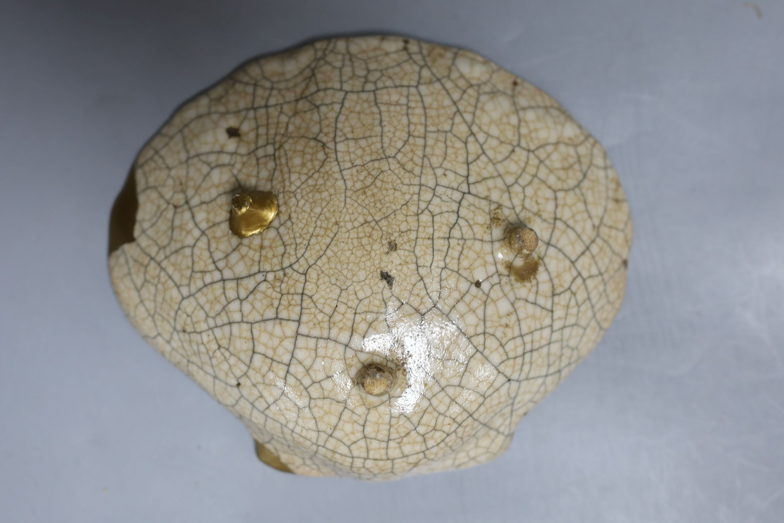 A Chinese Qingbai bowl and a Ge ware type shell dish, Yuan dynasty or later. Largest 18cm diameter